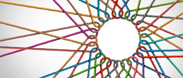 Different coloured ropes joining together a circle
