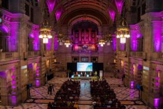 The room at Kelvingrove Museum with full audience for the launch of the Thriving Glasgow portrait.