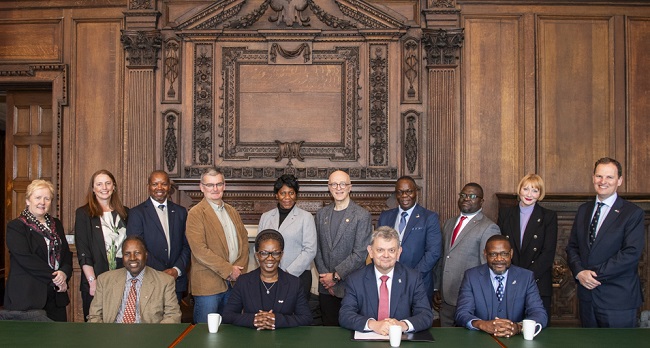 A group photo of representatives from the University of Glasgow, Kamuzu University of Health Sciences, the Scotland-Malawi Partnership, the Scottish Government and Scotland's International Development Initiative