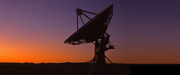 A satellite receiver pointing to the sky