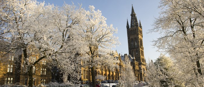 Main building through the trees in winter