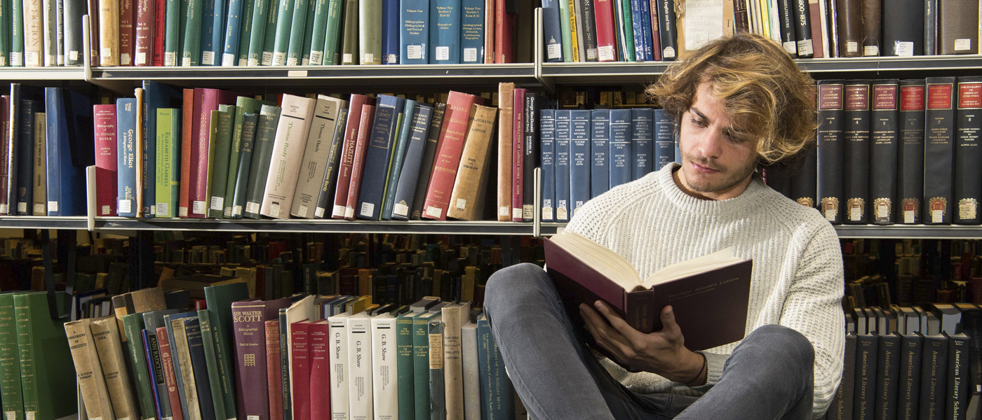 A student reading in the Library