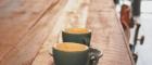 Empty coffee cups on wooden table