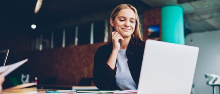 Woman sitting at a laptop