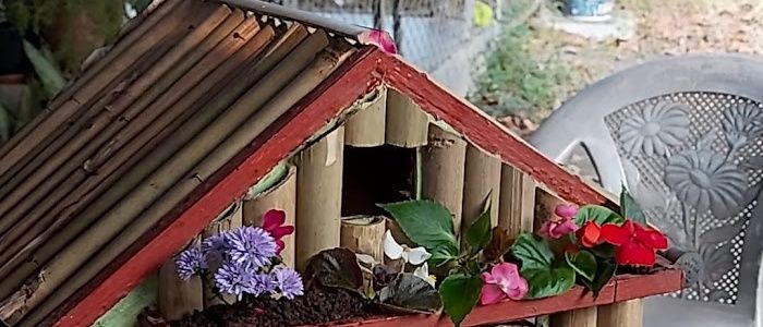 Close up of a model house built of wood