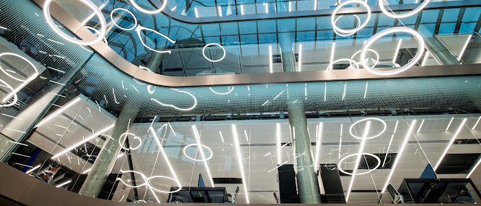 Inside of the Mazumdar-Shaw Advanced Research Centre showing the circular lights over the balcony