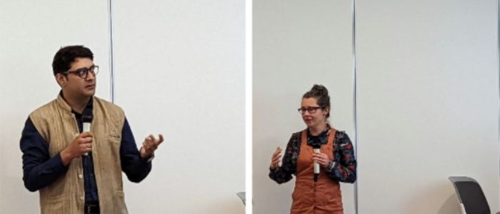 Staff from IISER Pune and Glasgow stood up presenting