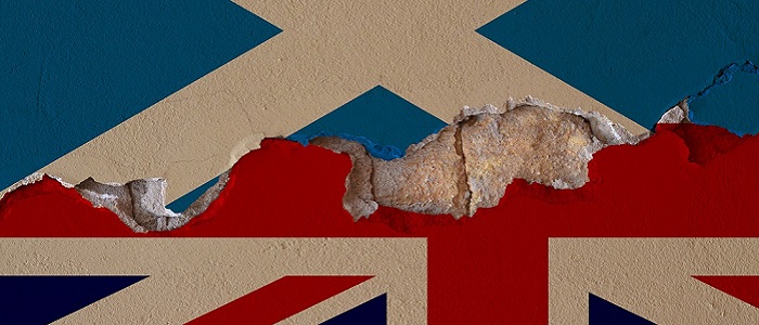 A Saltire and Union flag painted on a wall with the plaster crumbling and creating gaps between them. iStockphoto https://www.istockphoto.com/photo/scottish-independence-referendum-indyref-gm661468142-120601461