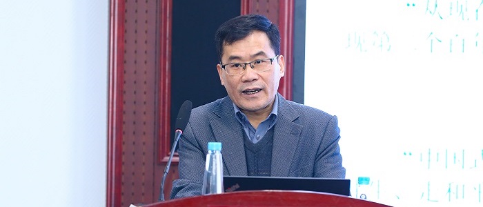 A man at a podium. Source: Peking University